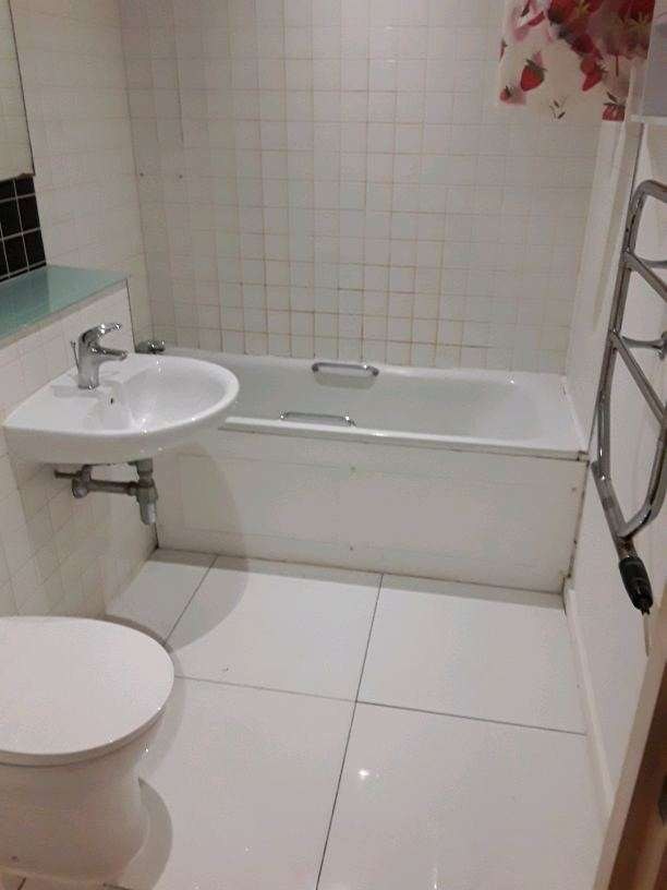 Bathroom before genuine GrimeBreakers cleaning